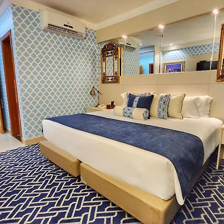 Golden Lis Hotel Boutique Goiânia Exterior photo A bedroom at the hotel